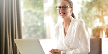 Photo by Andrea Piacquadio: https://www.pexels.com/photo/laughing-businesswoman-working-in-office-with-laptop-3756679/