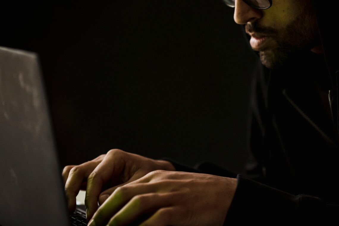 Photo by Sora Shimazaki: https://www.pexels.com/photo/crop-bearded-man-working-on-laptop-in-darkness-5926362/