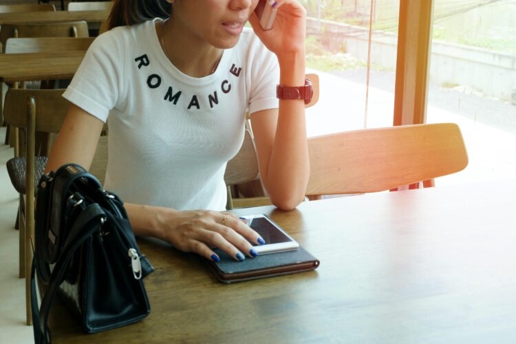 Photo by Porapak Apichodilok: https://www.pexels.com/photo/woman-wearing-white-romance-printed-crew-neck-t-shirt-while-sitting-on-brown-wooden-chair-346741/