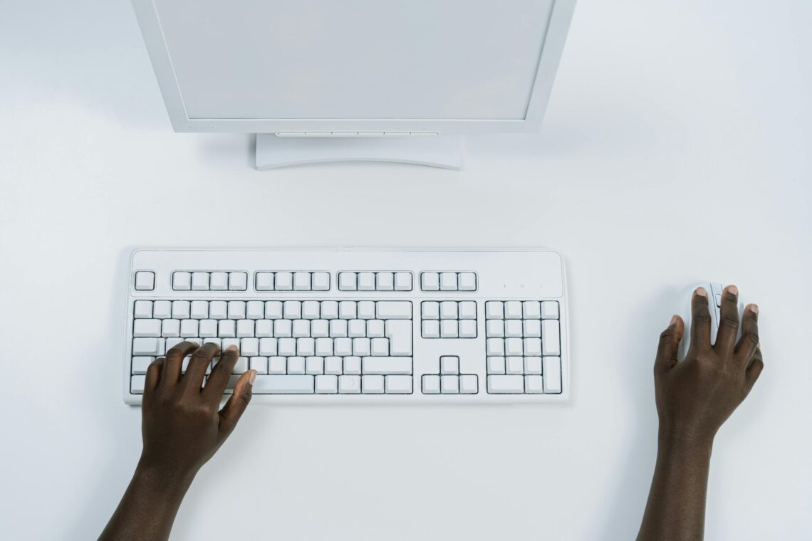 Photo by cottonbro studio: https://www.pexels.com/photo/person-using-a-white-computer-set-5185153/