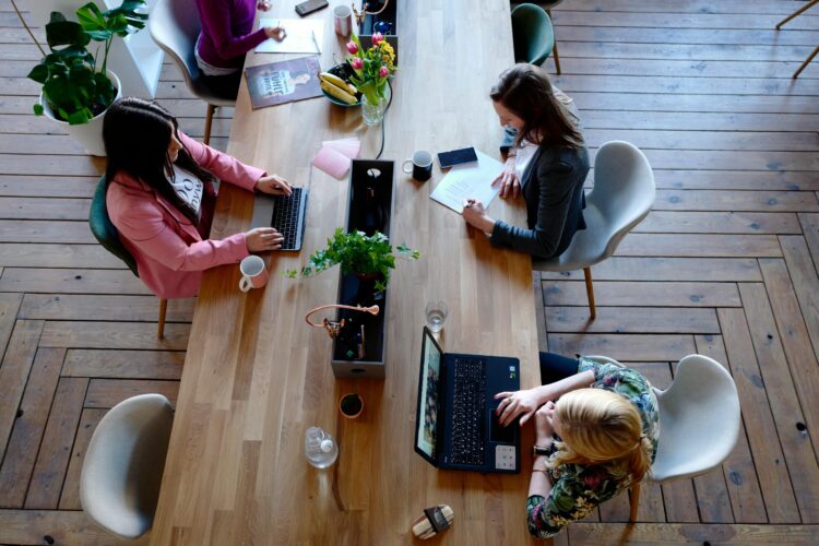 Photo by CoWomen from Pexels: https://www.pexels.com/photo/three-woman-sitting-on-white-chair-in-front-of-table-2041627/