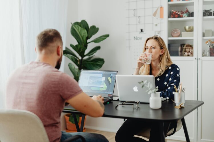 Photo by Karolina Kaboompics: https://www.pexels.com/photo/man-and-woman-sharing-desk-at-office-5904093/