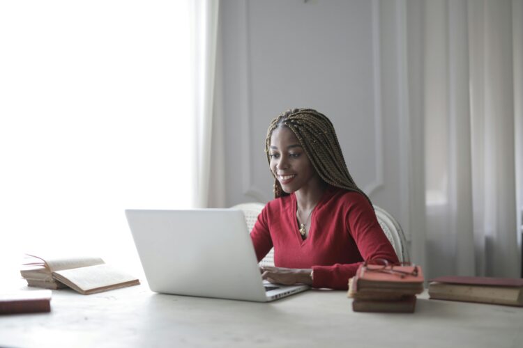 Photo by Andrea Piacquadio: https://www.pexels.com/photo/woman-in-red-long-sleeve-shirt-using-macbook-air-3786763/