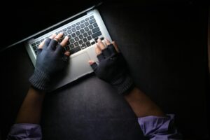 Photo by Towfiqu barbhuiya: https://www.pexels.com/photo/a-person-typing-on-laptop-while-wearing-a-fingerless-gloves-8541751/