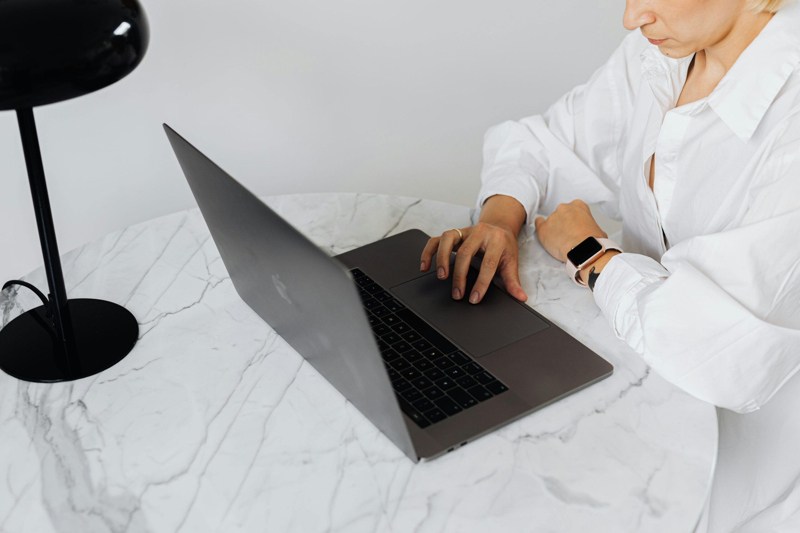 Photo by Karolina Kaboompics: https://www.pexels.com/photo/high-angle-view-of-woman-using-laptop-4968723/