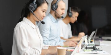 Photo by Mikhail Nilov: https://www.pexels.com/photo/shallow-focus-of-woman-working-in-a-call-center-7682340/