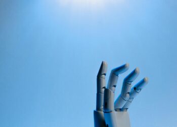 Photo by Tara Winstead: https://www.pexels.com/photo/robot-fingers-on-blue-background-8386369/