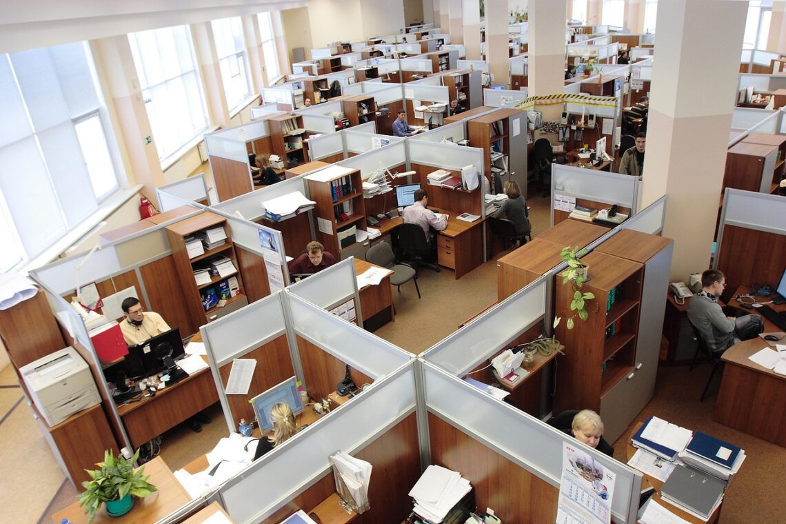 https://pixabay.com/photos/office-cubicles-employees-working-95311/