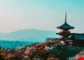 Photo by Belle Co: https://www.pexels.com/photo/red-and-black-temple-surrounded-by-trees-photo-402028/