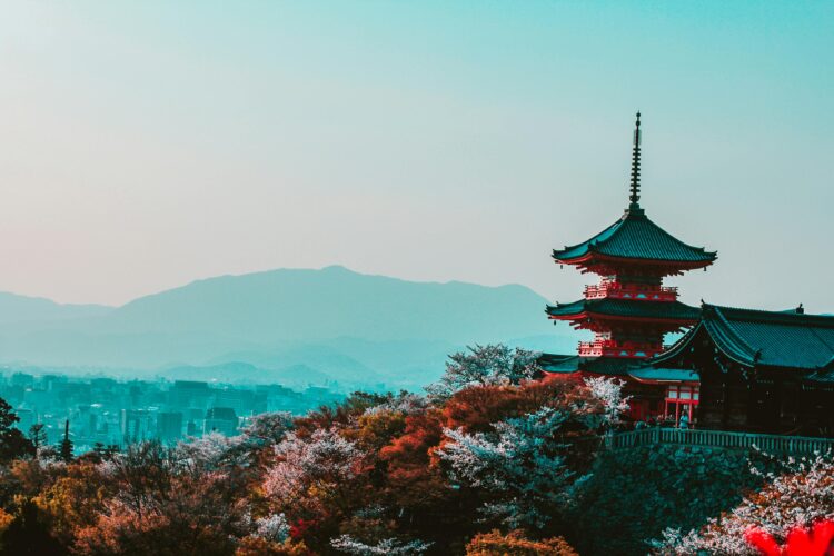 Photo by Belle Co: https://www.pexels.com/photo/red-and-black-temple-surrounded-by-trees-photo-402028/