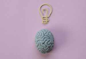 Photo by KATRIN BOLOVTSOVA: https://www.pexels.com/photo/paperclip-in-a-shape-of-a-light-bulb-and-a-rubber-eraser-in-a-shape-of-a-brain-6193936/
