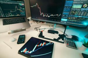 Photo by Jakub Zerdzicki: https://www.pexels.com/photo/trading-desk-with-financial-charts-and-technology-31650949/