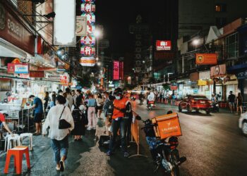Photo by Tony Wu from Pexels: https://www.pexels.com/photo/people-walking-on-flea-market-during-nighttime-10532275/