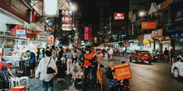 Photo by Tony Wu from Pexels: https://www.pexels.com/photo/people-walking-on-flea-market-during-nighttime-10532275/