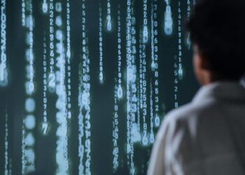 Photo by Ron Lach: https://www.pexels.com/photo/person-facing-a-big-screen-with-numbers-9783346/