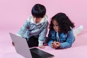 Photo by Amina Filkins: https://www.pexels.com/photo/multiethnic-kids-watching-computer-in-studio-5560076/
