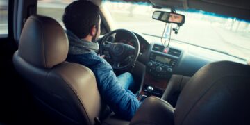 Photo by Atlantic Ambience: https://www.pexels.com/photo/man-wearing-blue-jacket-sitting-inside-car-while-driving-376729/