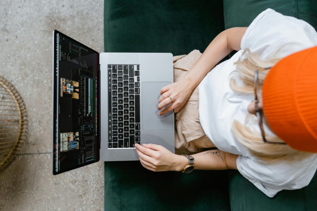 Photo by MART PRODUCTION: https://www.pexels.com/photo/a-woman-wearing-eyeglasses-and-a-bonnet-using-a-laptop-7679751/