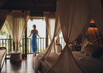 Photo by Elina Sazonova: https://www.pexels.com/photo/woman-leaning-on-handrail-in-room-1838554/