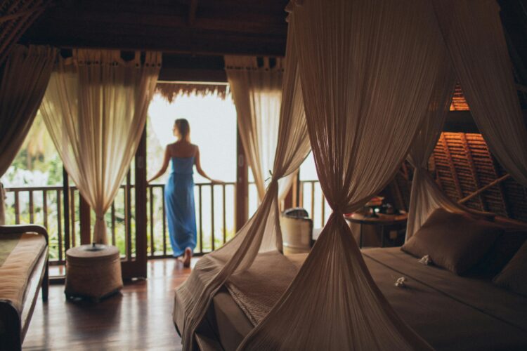 Photo by Elina Sazonova: https://www.pexels.com/photo/woman-leaning-on-handrail-in-room-1838554/