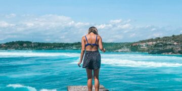 Photo by Tiff Ng from Pexels: https://www.pexels.com/photo/woman-standing-on-dock-2097613/