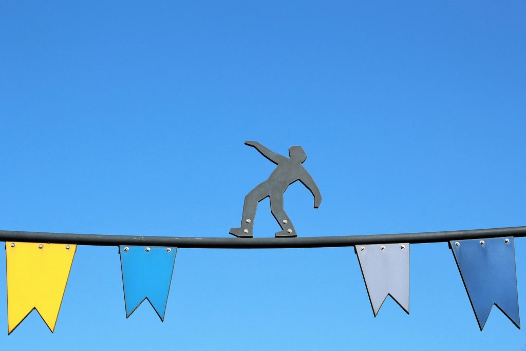 Photo by Michaela St: https://www.pexels.com/photo/figurine-of-acrobat-on-line-20764199/