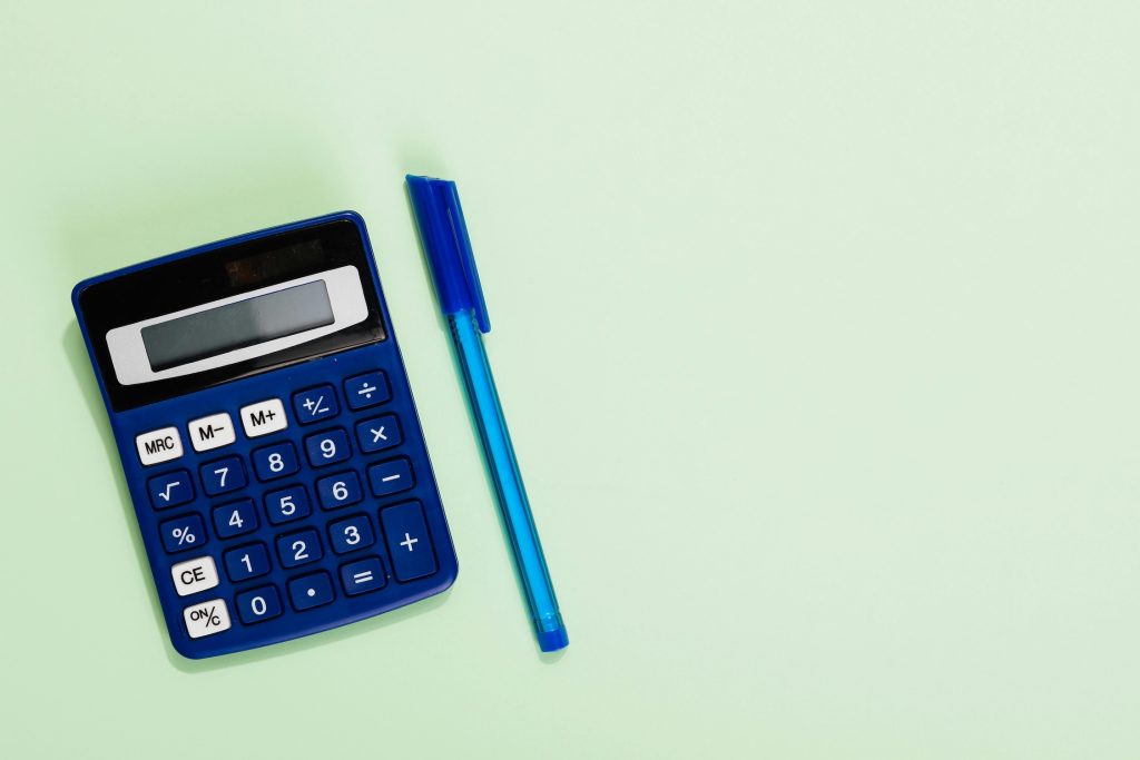 Photo by www.kaboompics.com: https://www.pexels.com/photo/calculator-with-pen-5412200/