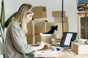 Photo by Kampus Production: https://www.pexels.com/photo/woman-using-brown-box-for-packaging-7289719/