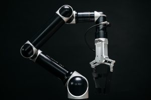 Photo by Pavel Danilyuk: https://www.pexels.com/photo/robot-on-a-black-background-8438865/