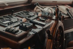 Photo by Nikolaos Dimou: https://www.pexels.com/photo/close-up-photogrpahy-ship-captains-control-1416649/